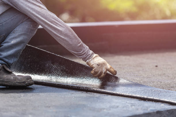 Professional Basement Waterproofing technician working in Austin, IN